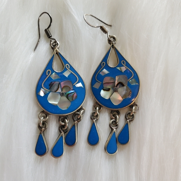 Jewelry - Cobalt Mexican blue and silver dangle earrings with flower design in center.